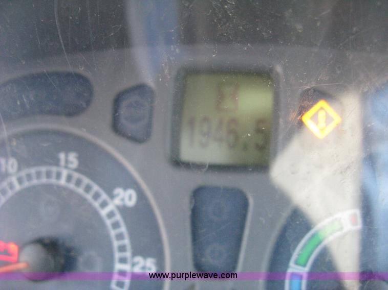 image for item H5311 2004 New Holland TS100A Plus tractor