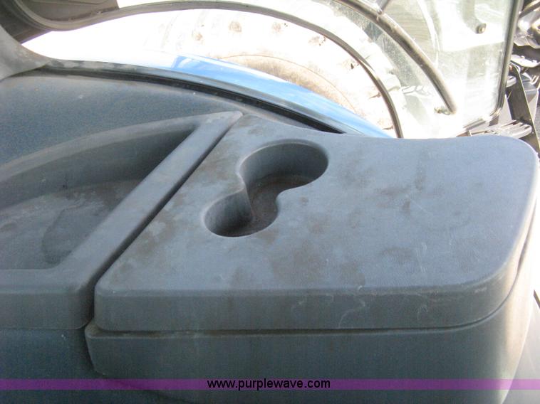 image for item H5311 2004 New Holland TS100A Plus tractor