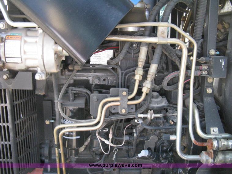 image for item H5311 2004 New Holland TS100A Plus tractor