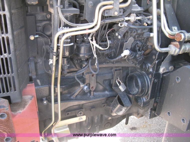 image for item H5311 2004 New Holland TS100A Plus tractor