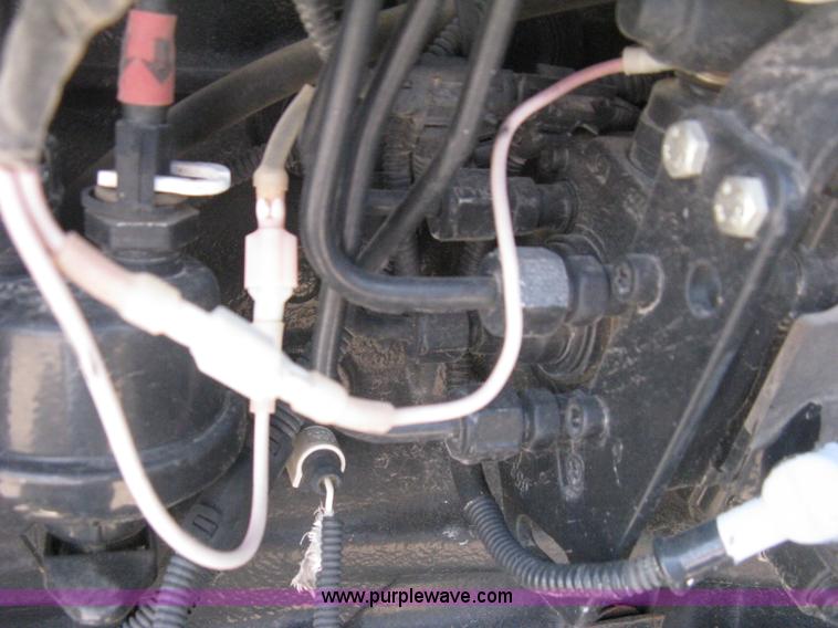 image for item H5311 2004 New Holland TS100A Plus tractor