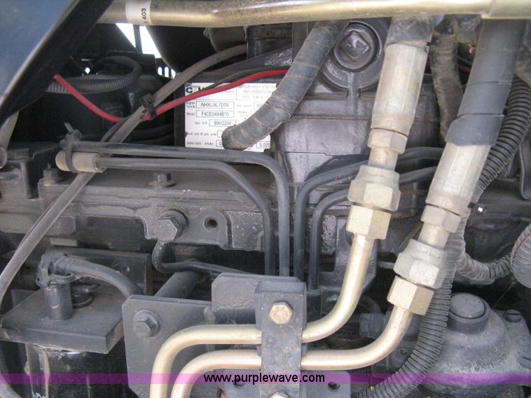 image for item H5311 2004 New Holland TS100A Plus tractor