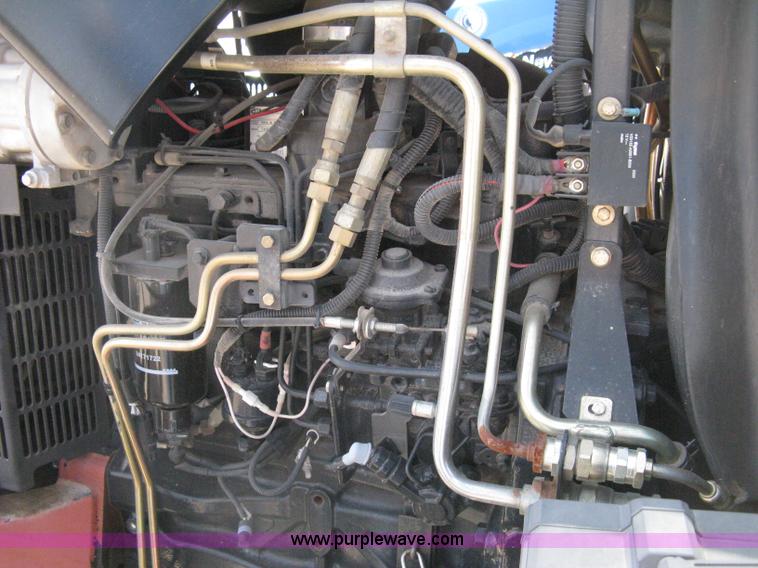 image for item H5311 2004 New Holland TS100A Plus tractor