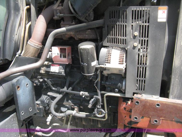 image for item H5311 2004 New Holland TS100A Plus tractor