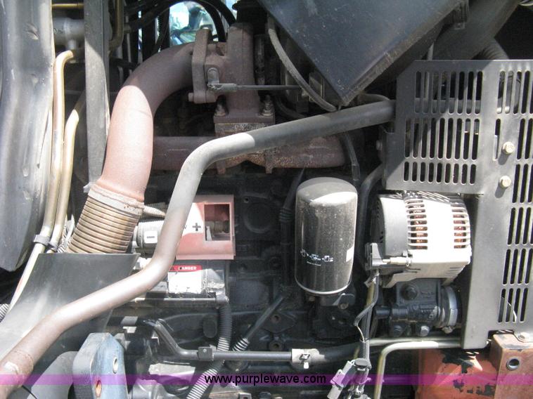 image for item H5311 2004 New Holland TS100A Plus tractor