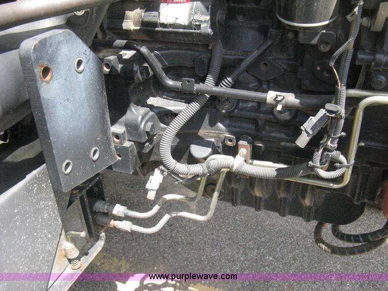 image for item H5311 2004 New Holland TS100A Plus tractor