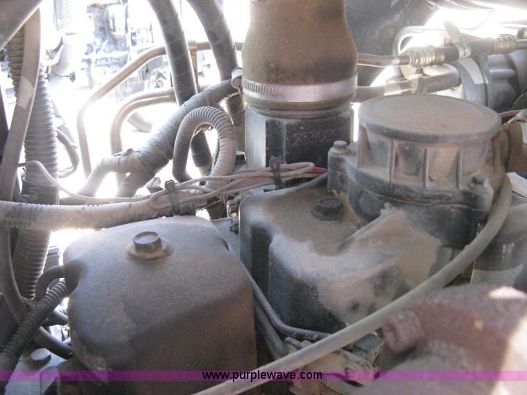 image for item H5311 2004 New Holland TS100A Plus tractor