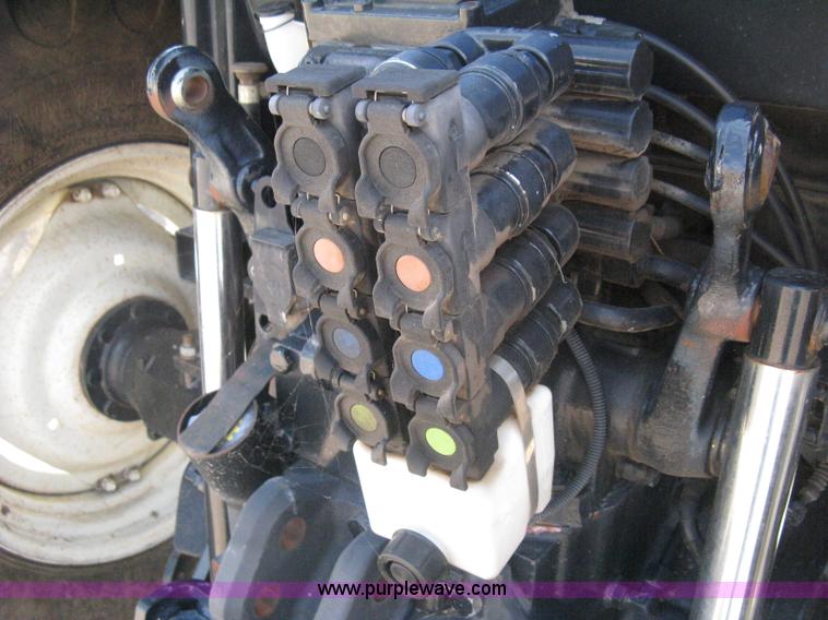 image for item H5311 2004 New Holland TS100A Plus tractor