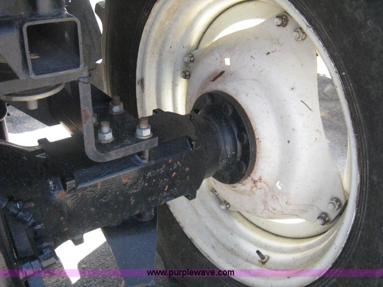 image for item H5311 2004 New Holland TS100A Plus tractor