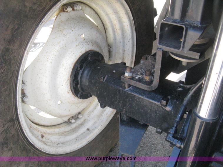 image for item H5311 2004 New Holland TS100A Plus tractor