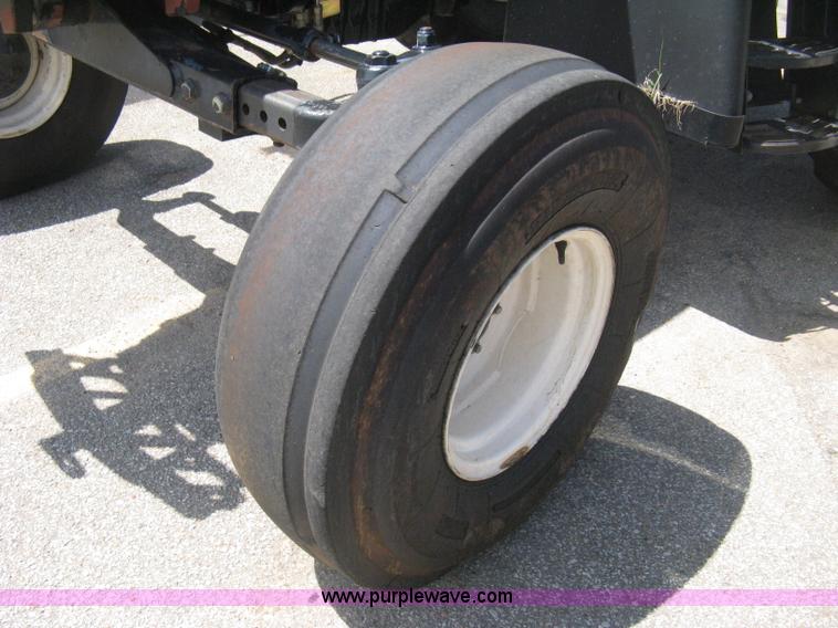 image for item H5311 2004 New Holland TS100A Plus tractor