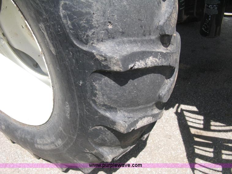 image for item H5311 2004 New Holland TS100A Plus tractor