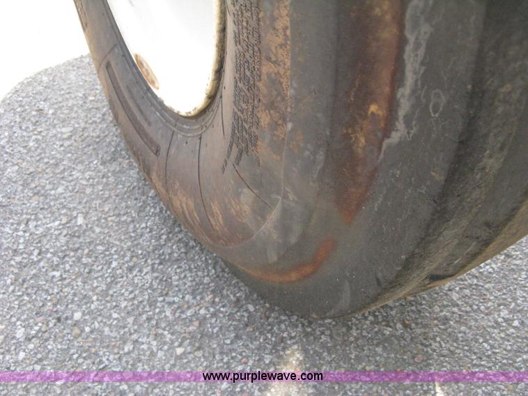 image for item H5311 2004 New Holland TS100A Plus tractor