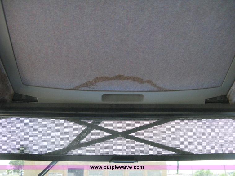 image for item H5312 2004 New Holland TS100A Plus tractor