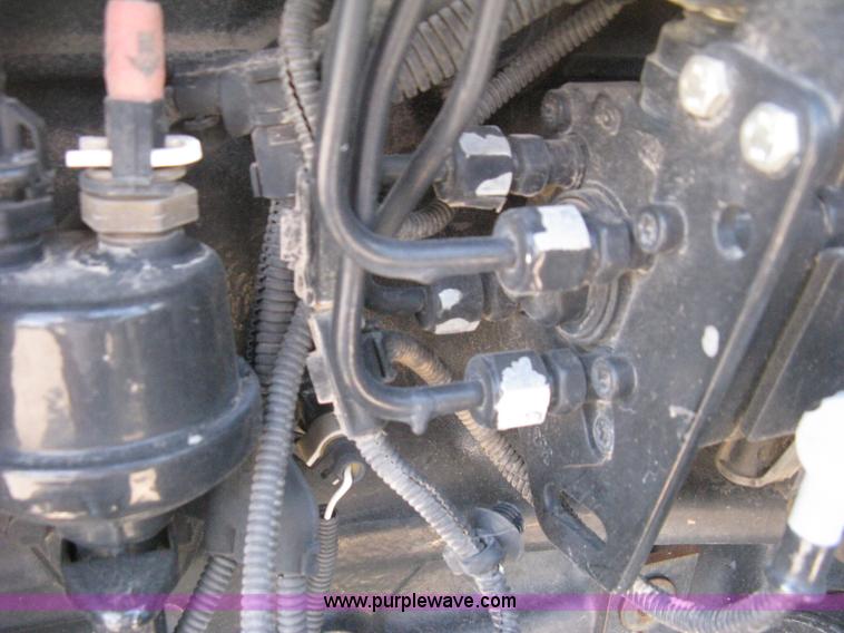 image for item H5312 2004 New Holland TS100A Plus tractor