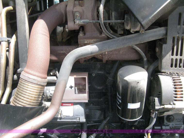 image for item H5312 2004 New Holland TS100A Plus tractor