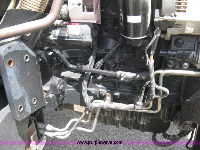 image for item H5312 2004 New Holland TS100A Plus tractor