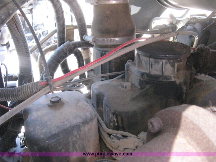 image for item H5312 2004 New Holland TS100A Plus tractor