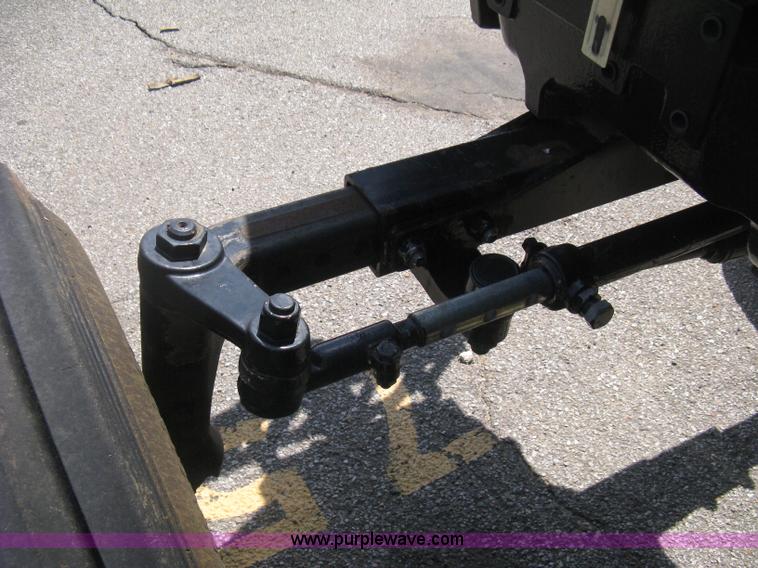 image for item H5312 2004 New Holland TS100A Plus tractor