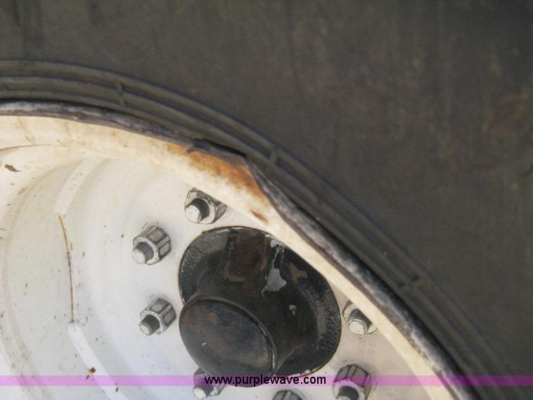 image for item H5312 2004 New Holland TS100A Plus tractor