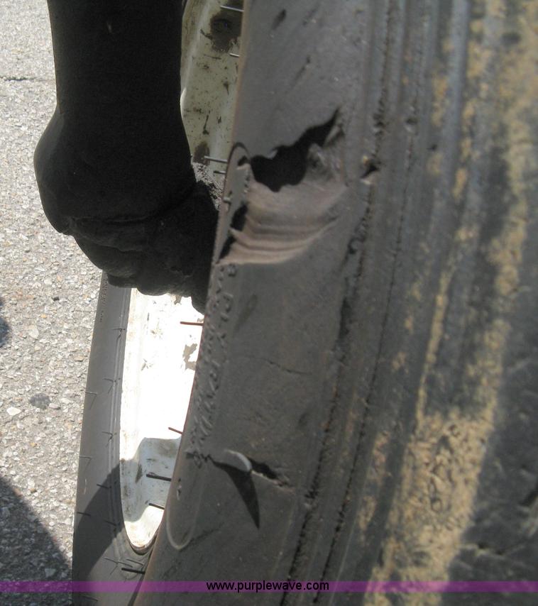 image for item H5312 2004 New Holland TS100A Plus tractor