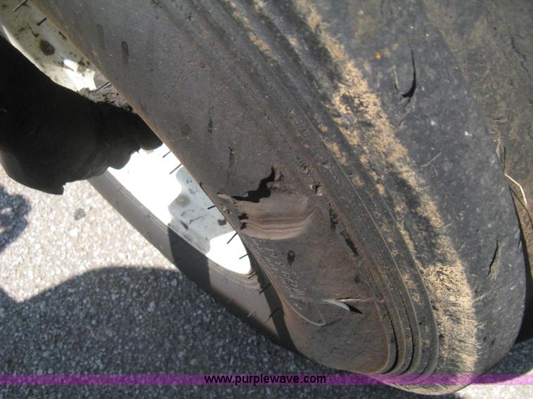 image for item H5312 2004 New Holland TS100A Plus tractor