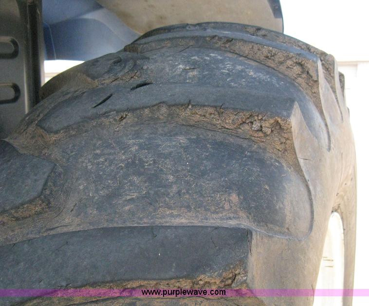 image for item H5312 2004 New Holland TS100A Plus tractor