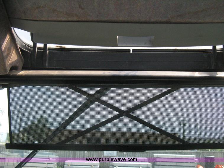 image for item H5313 2004 New Holland TS100A Plus tractor