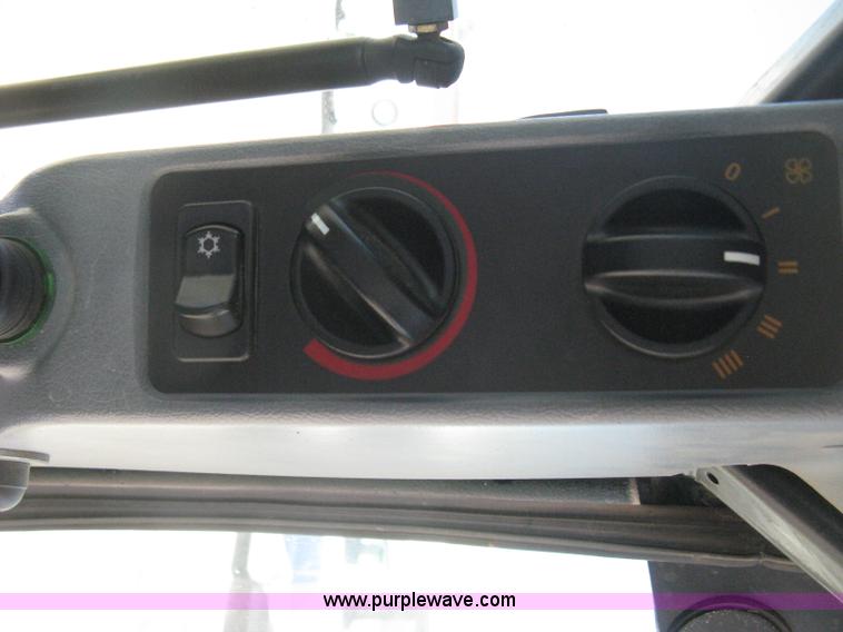 image for item H5313 2004 New Holland TS100A Plus tractor