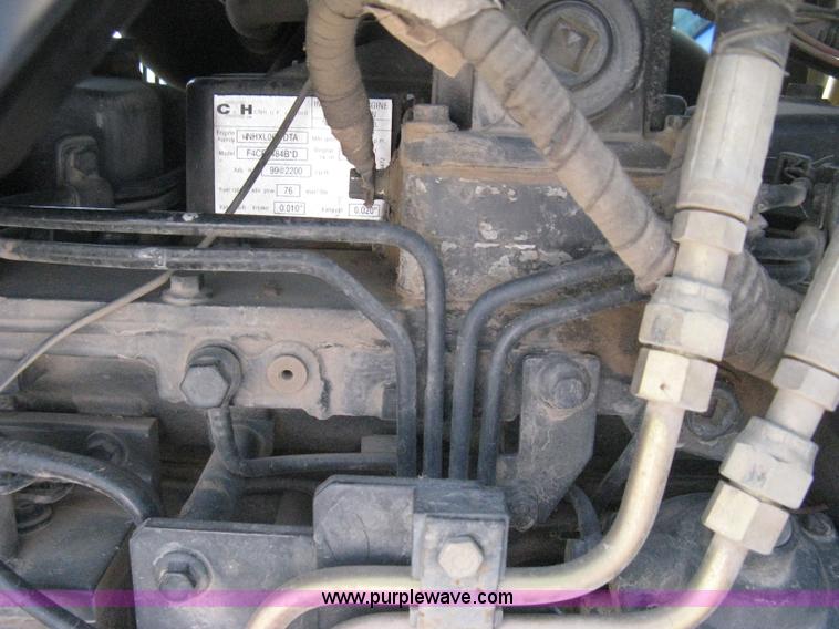 image for item H5313 2004 New Holland TS100A Plus tractor