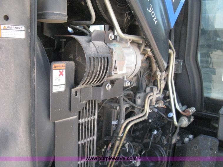 image for item H5313 2004 New Holland TS100A Plus tractor