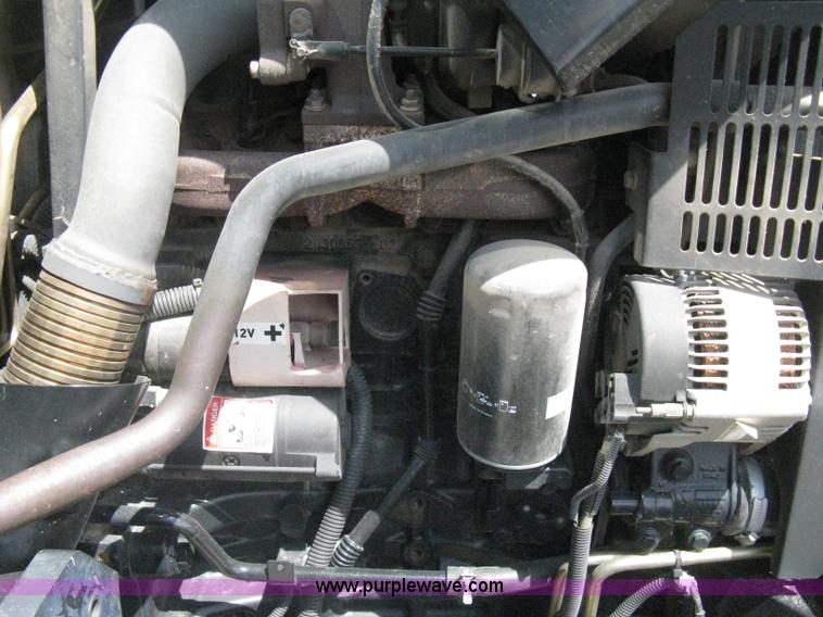 image for item H5313 2004 New Holland TS100A Plus tractor