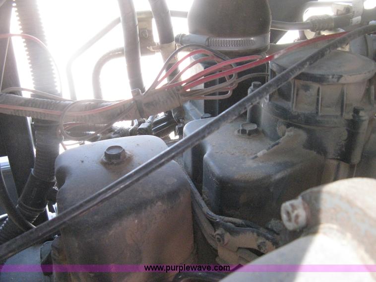 image for item H5313 2004 New Holland TS100A Plus tractor