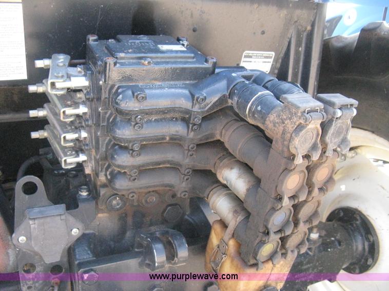 image for item H5313 2004 New Holland TS100A Plus tractor