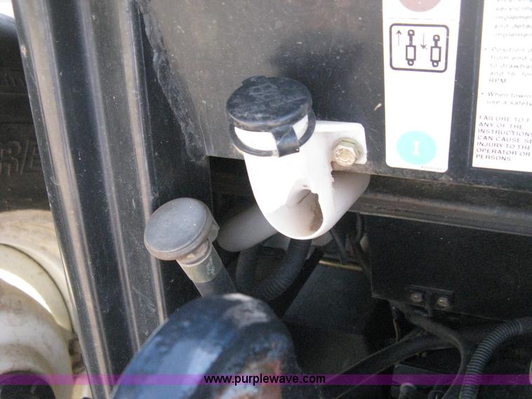 image for item H5313 2004 New Holland TS100A Plus tractor