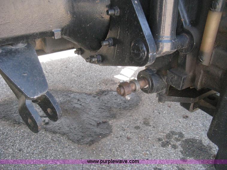 image for item H5313 2004 New Holland TS100A Plus tractor