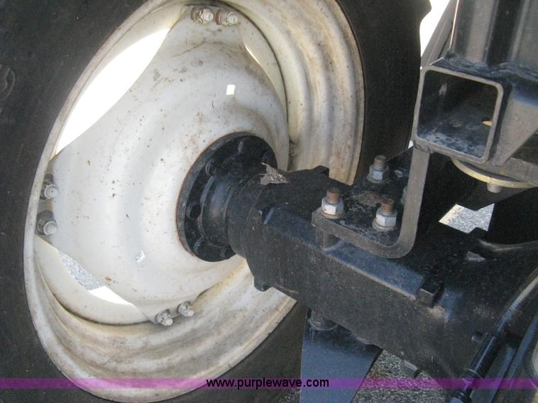 image for item H5313 2004 New Holland TS100A Plus tractor