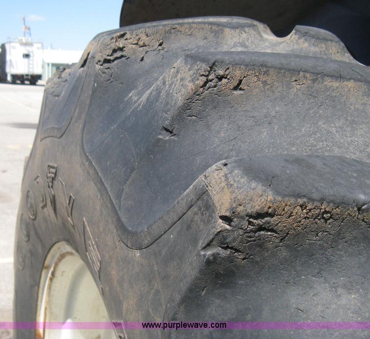 image for item H5313 2004 New Holland TS100A Plus tractor