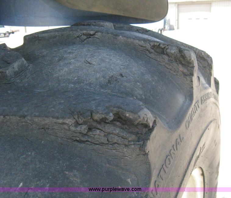 image for item H5313 2004 New Holland TS100A Plus tractor