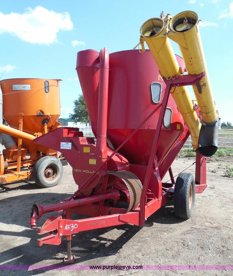 New Holland 353 grinder mixer in Kinsley, KS Item I3457 sold Purple