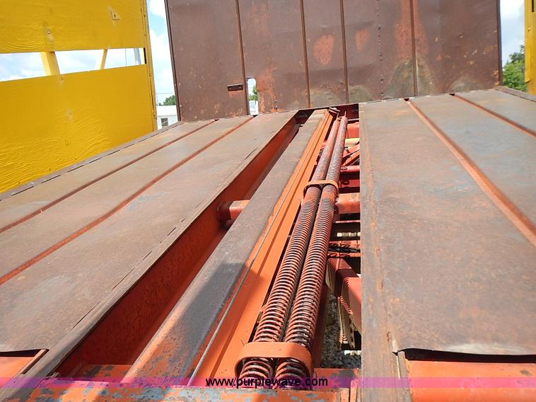 image for item I3521 New Holland 1049 stack cruiser