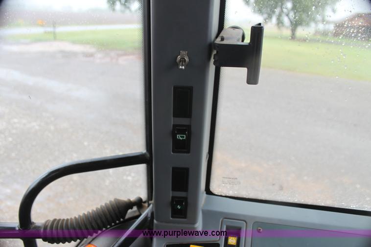 image for item I7256 1997 New Holland 7740SL MFWD tractor