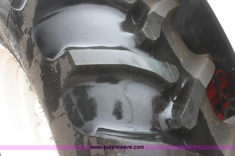 image for item I7256 1997 New Holland 7740SL MFWD tractor