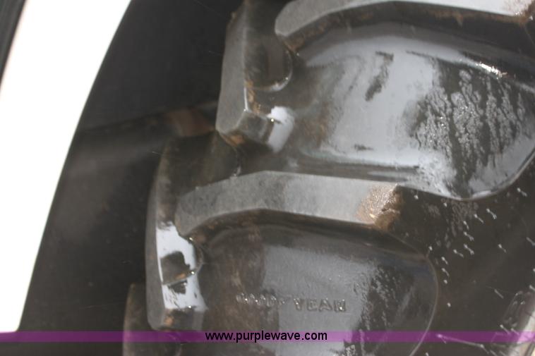 image for item I7256 1997 New Holland 7740SL MFWD tractor