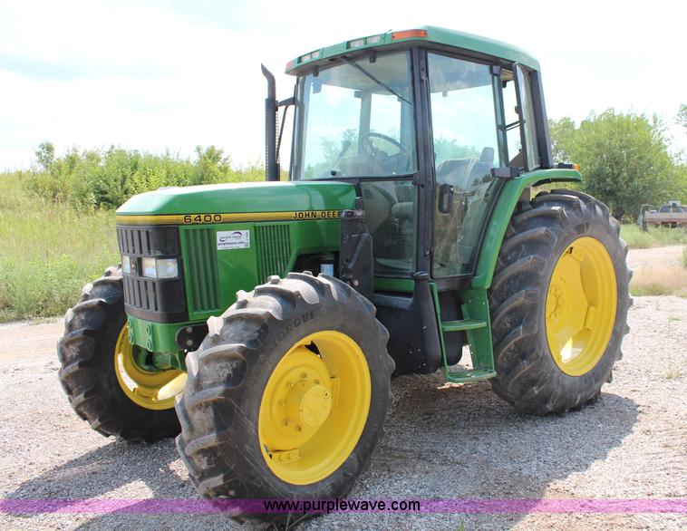 image for item J1089 1997 John Deere 6400 MFWD tractor