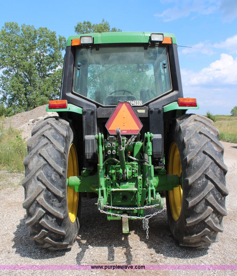 image for item J1089 1997 John Deere 6400 MFWD tractor