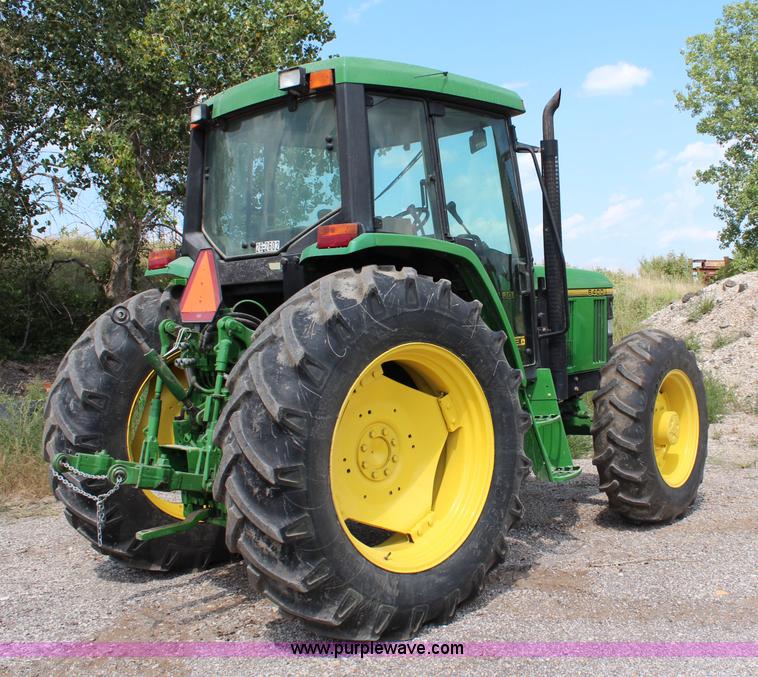 image for item J1089 1997 John Deere 6400 MFWD tractor