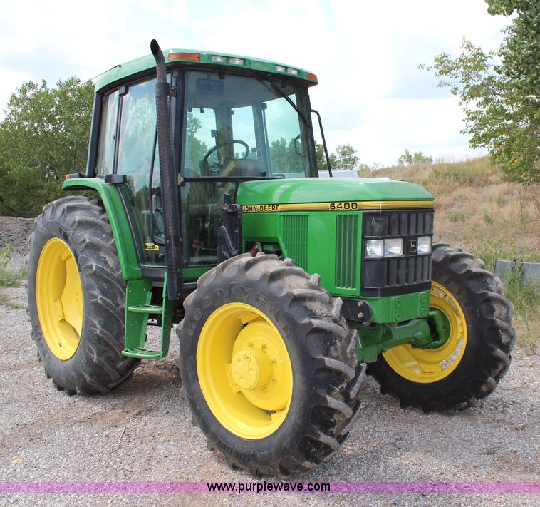 image for item J1089 1997 John Deere 6400 MFWD tractor