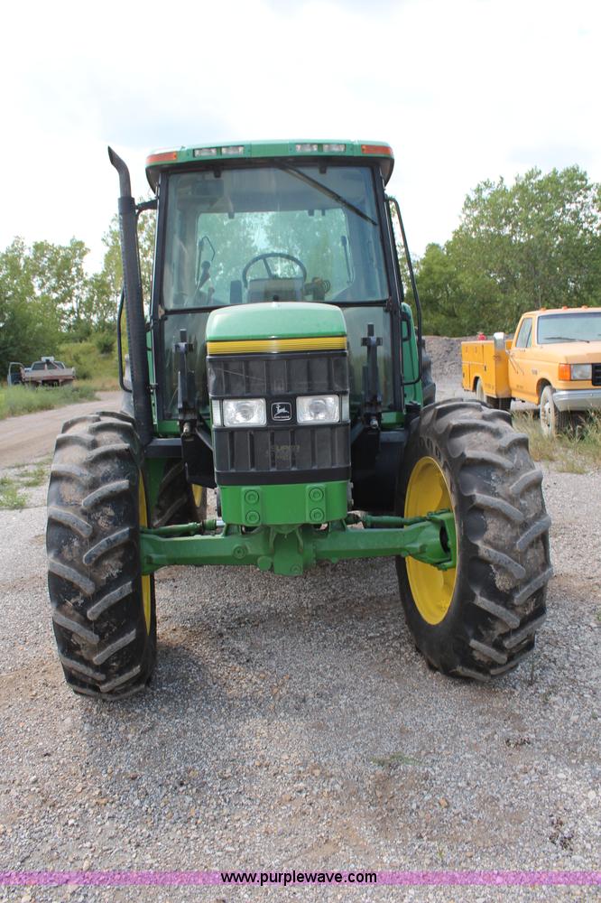 image for item J1089 1997 John Deere 6400 MFWD tractor