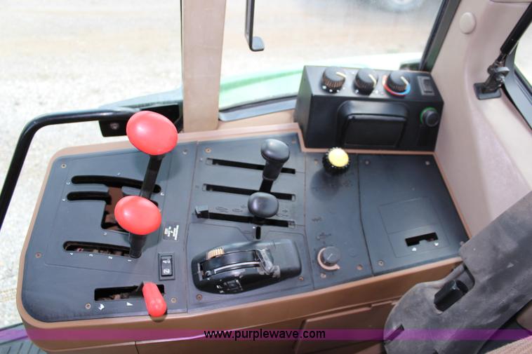 image for item J1089 1997 John Deere 6400 MFWD tractor